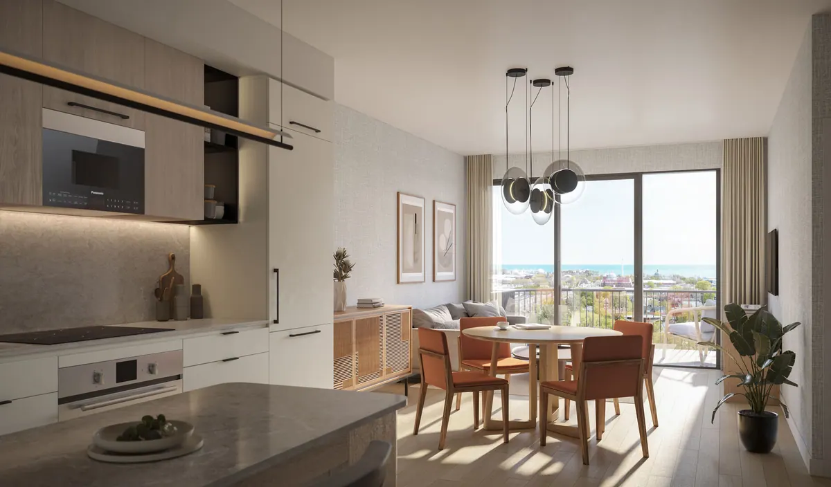 Artist's concept of a dining area with a round table beside the kitchen and a balcony door