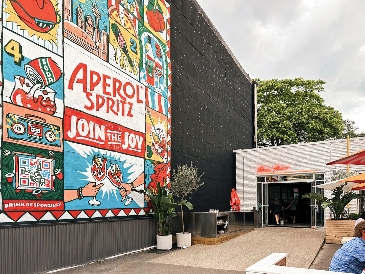 Colourful mural on a restaurant patio wall