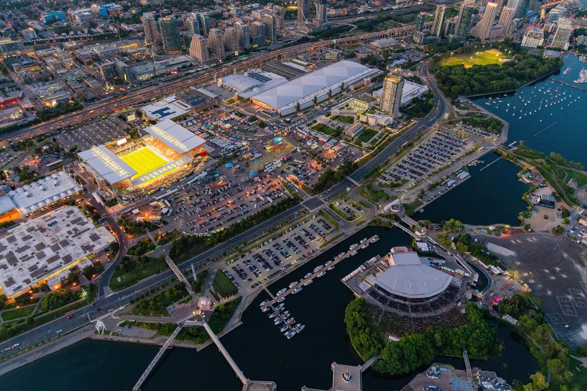 Aerial view of BMO Field, Exhibition Place and Ontario Place on the waterfront